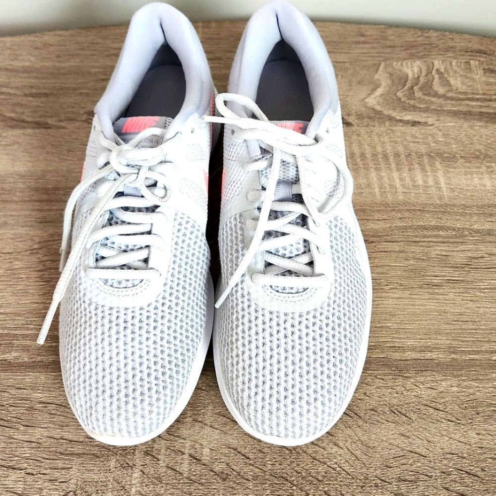 Nike Women's White Mesh Athletic Shoes with Pink Accent